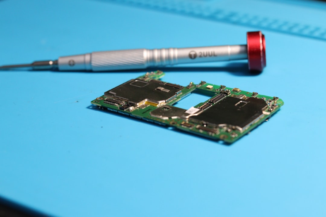 ✨ Conclusion: Your Next Microcontroller Adventure Awaits! by Robotic Coding A circuit board is near a screwdriver.