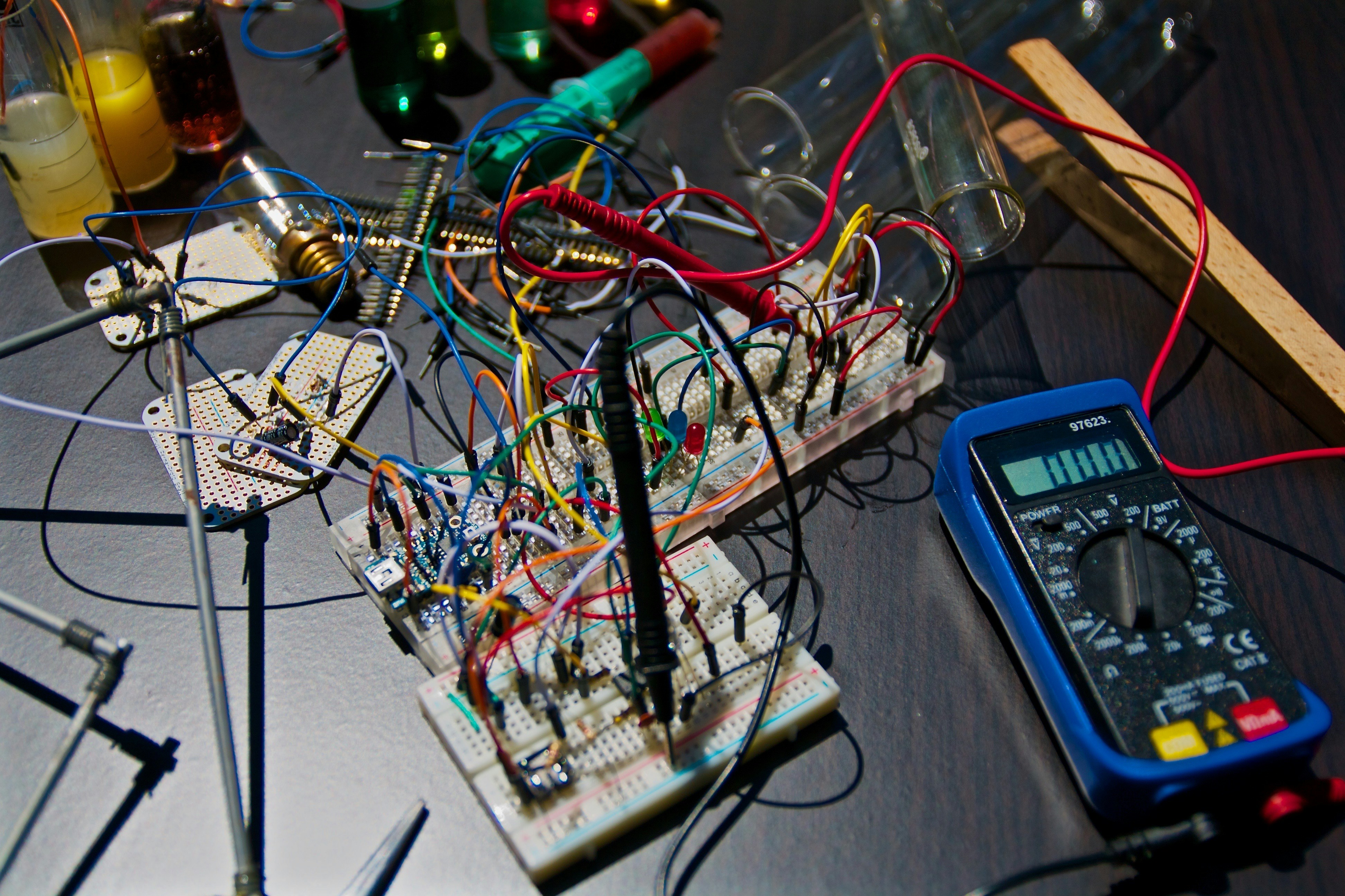 Experimentation by Robotic Coding electronic circuit boards near tester