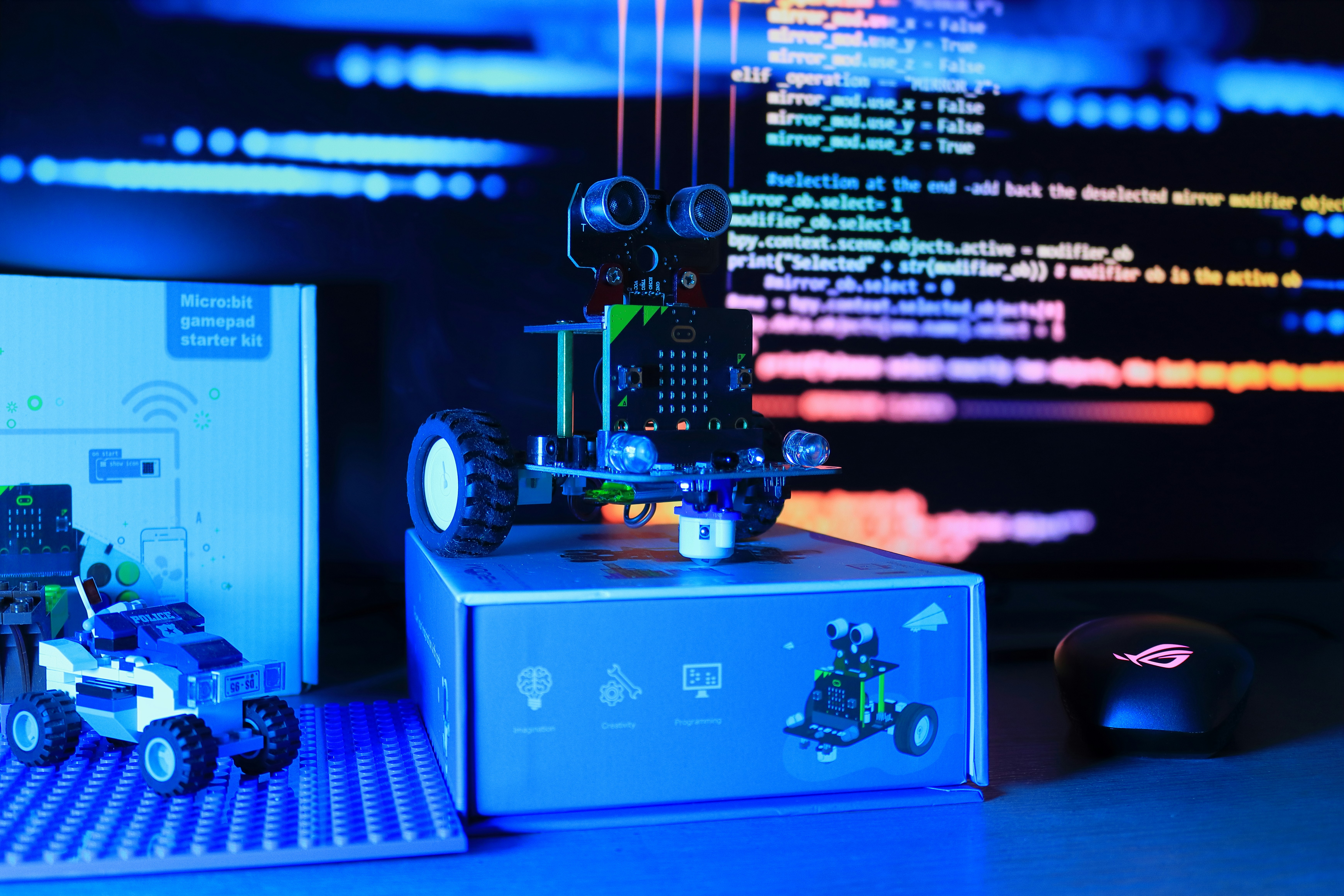 a robot that is sitting on top of a box