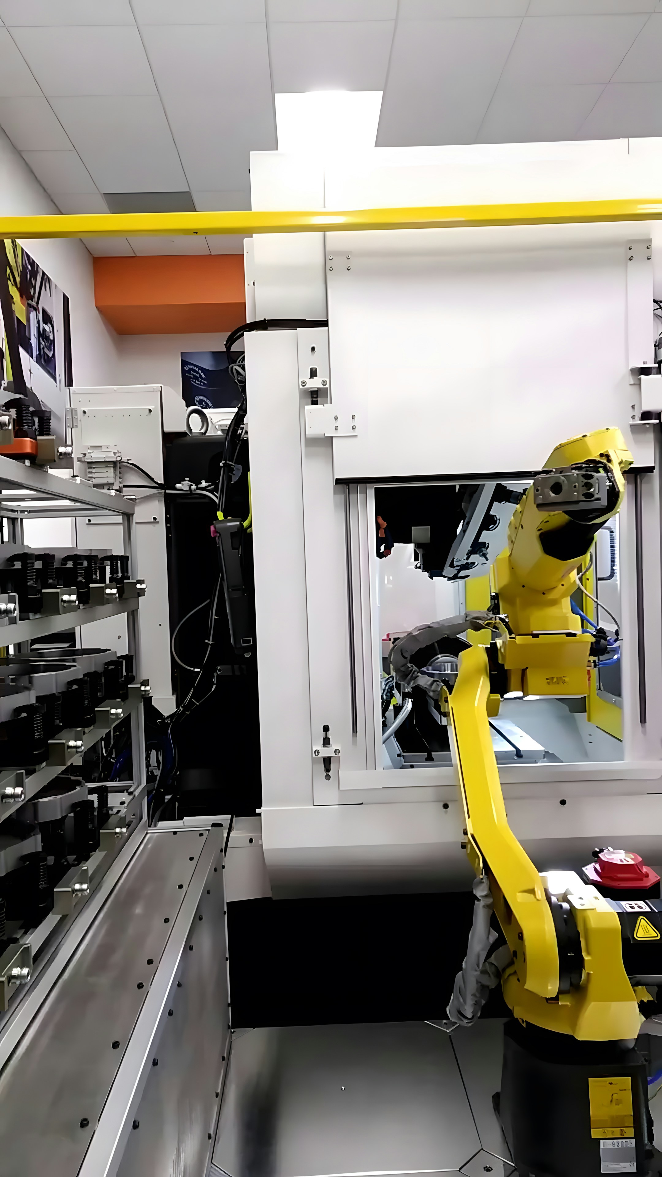 A robot arm works in a factory setting.