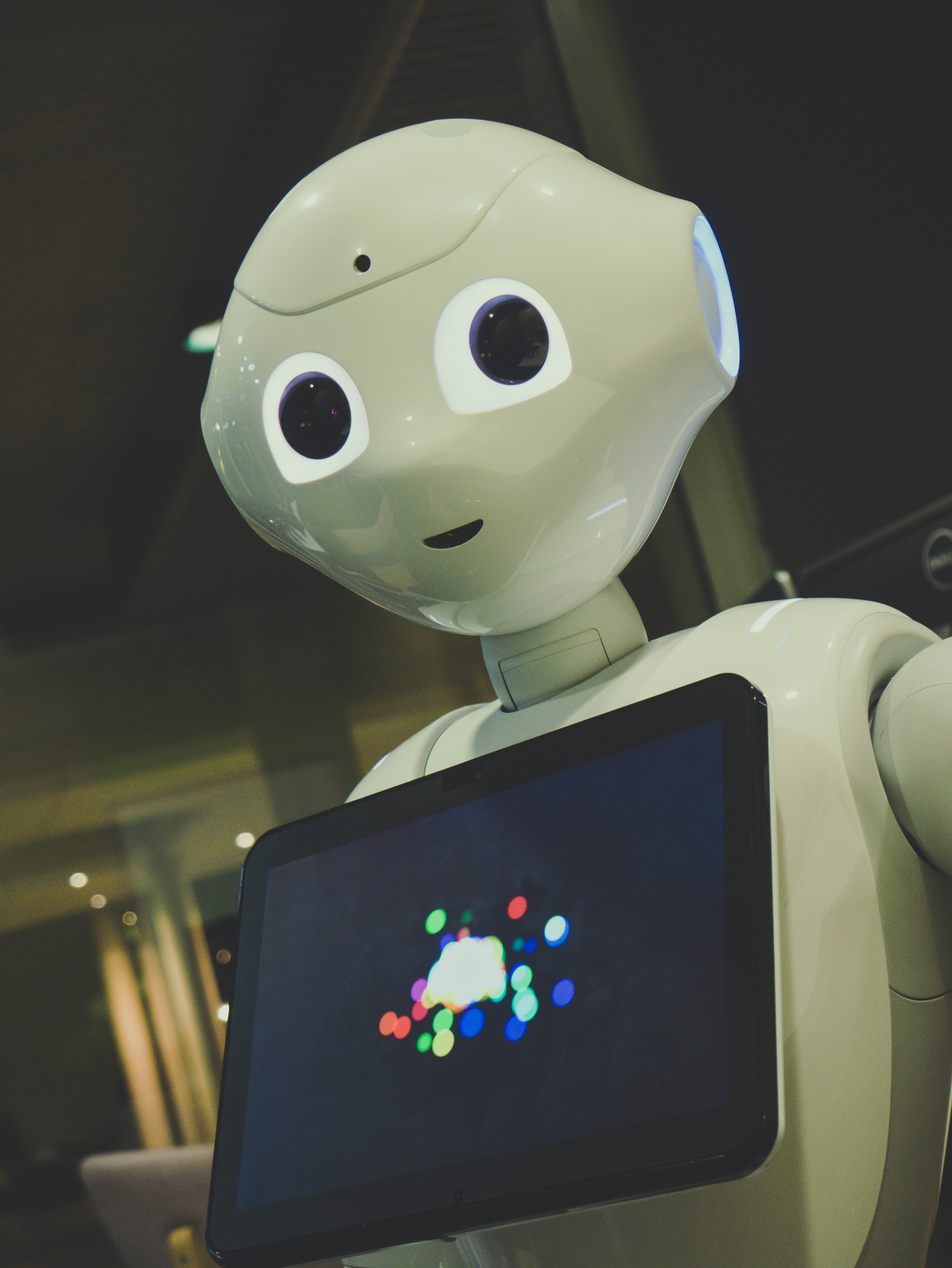 My best friend Pepper by Robotic Coding white robot toy holding black tablet