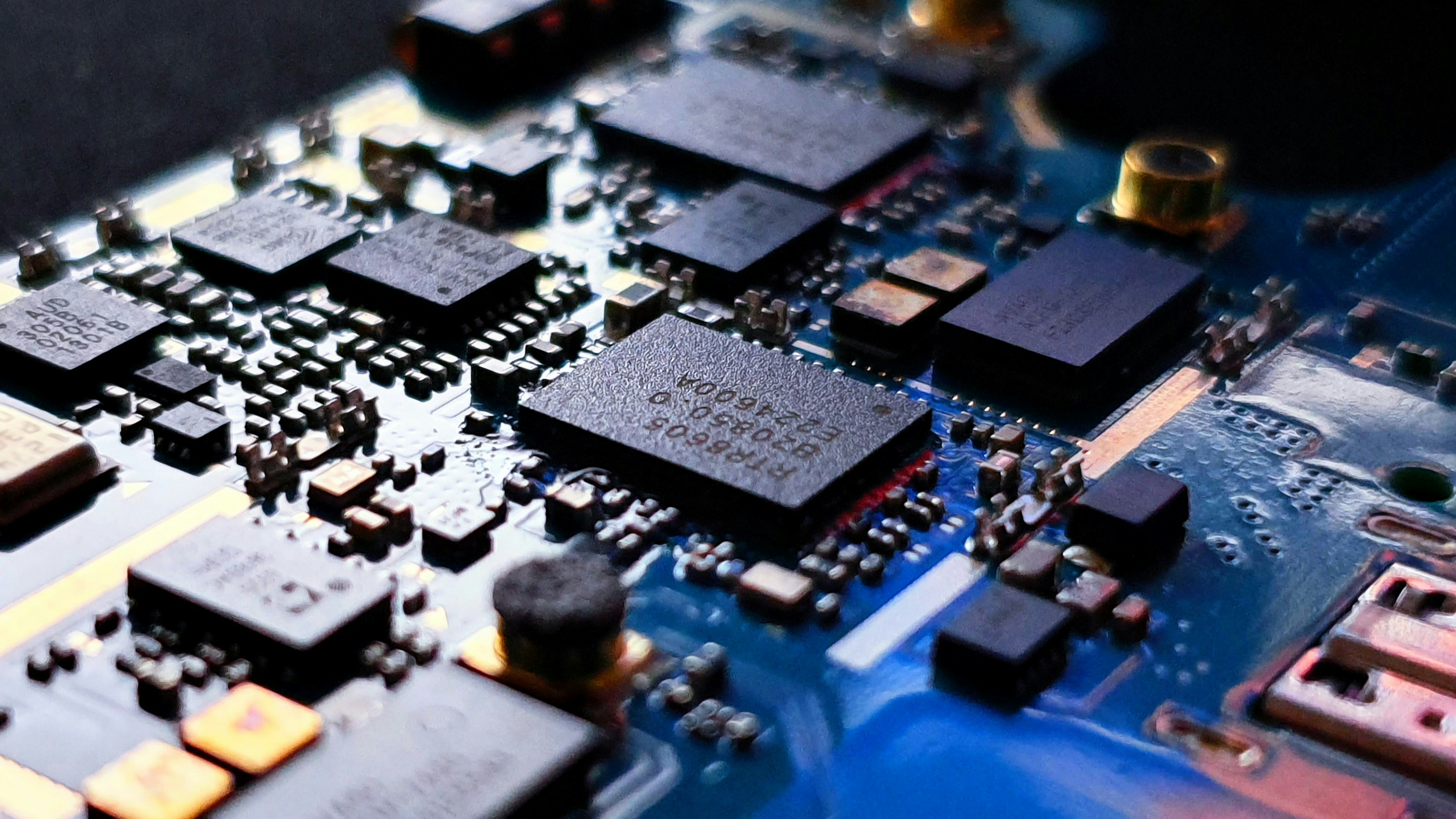 Embedded systems programming by Robotic Coding blue circuit board