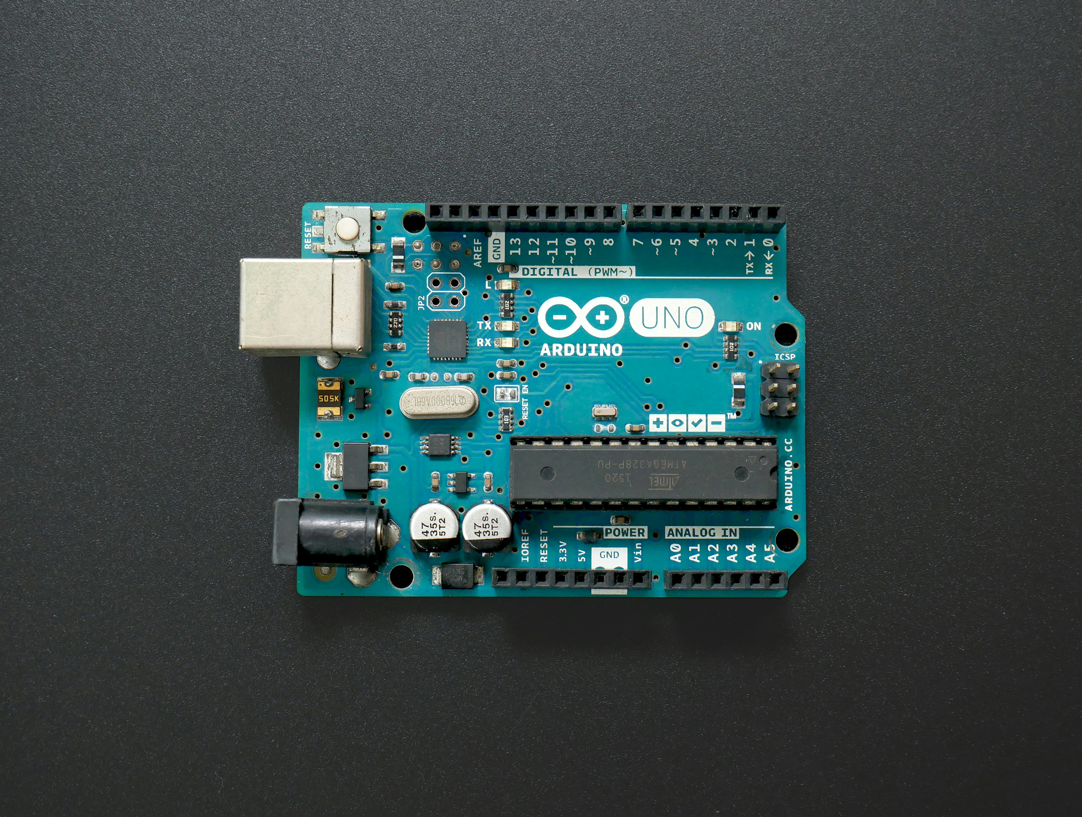An Arduino Uno board. by Robotic Coding a close up of a small electronic device on a table