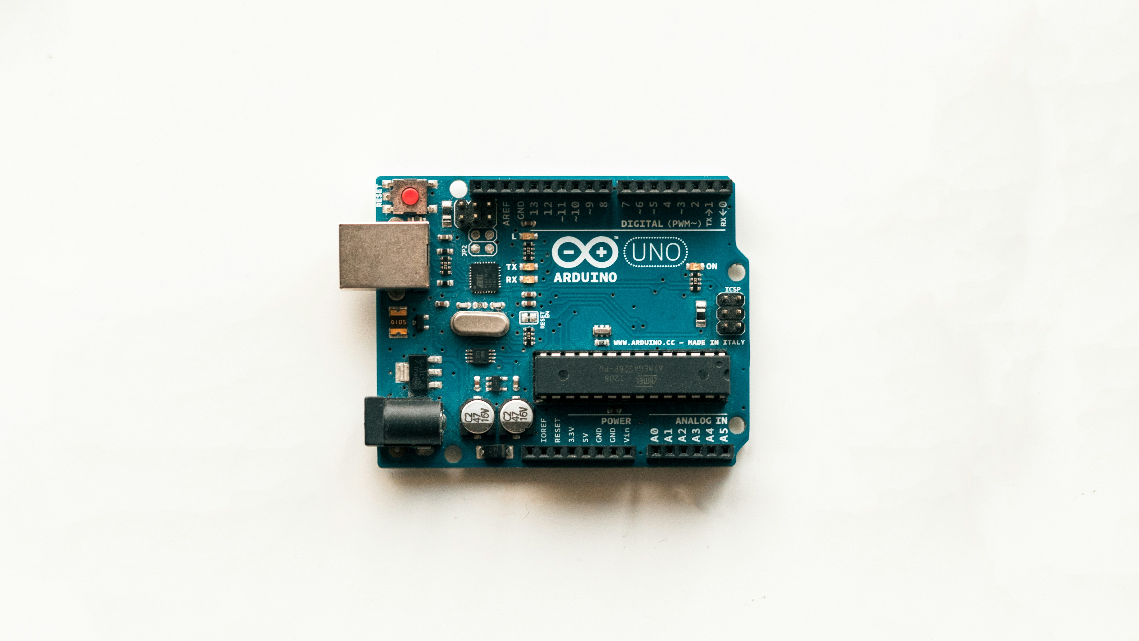 Arduino uno electronics board by Robotic Coding blue and black circuit board