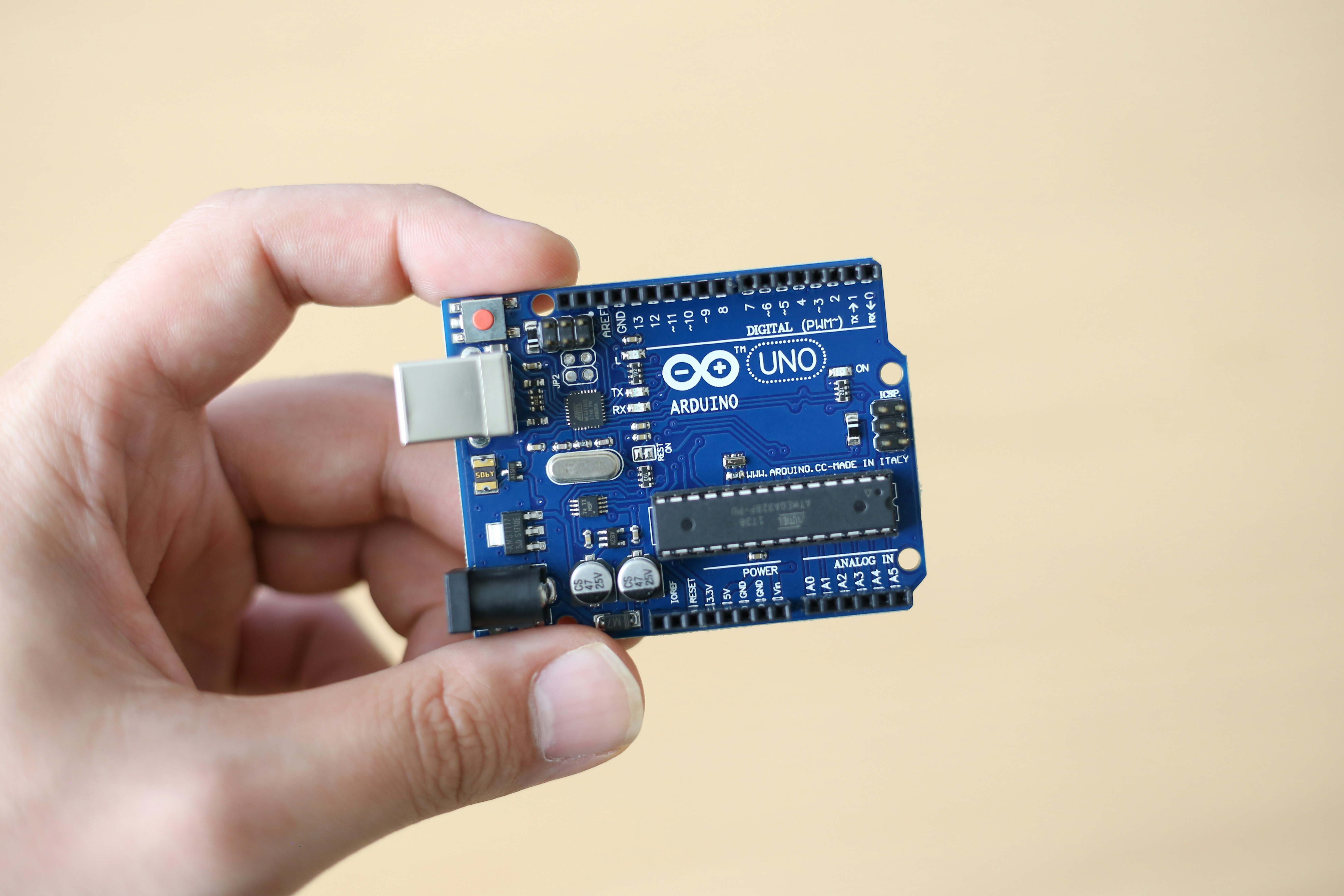 Arduino Uno by Robotic Coding a person holding a small electronic device
