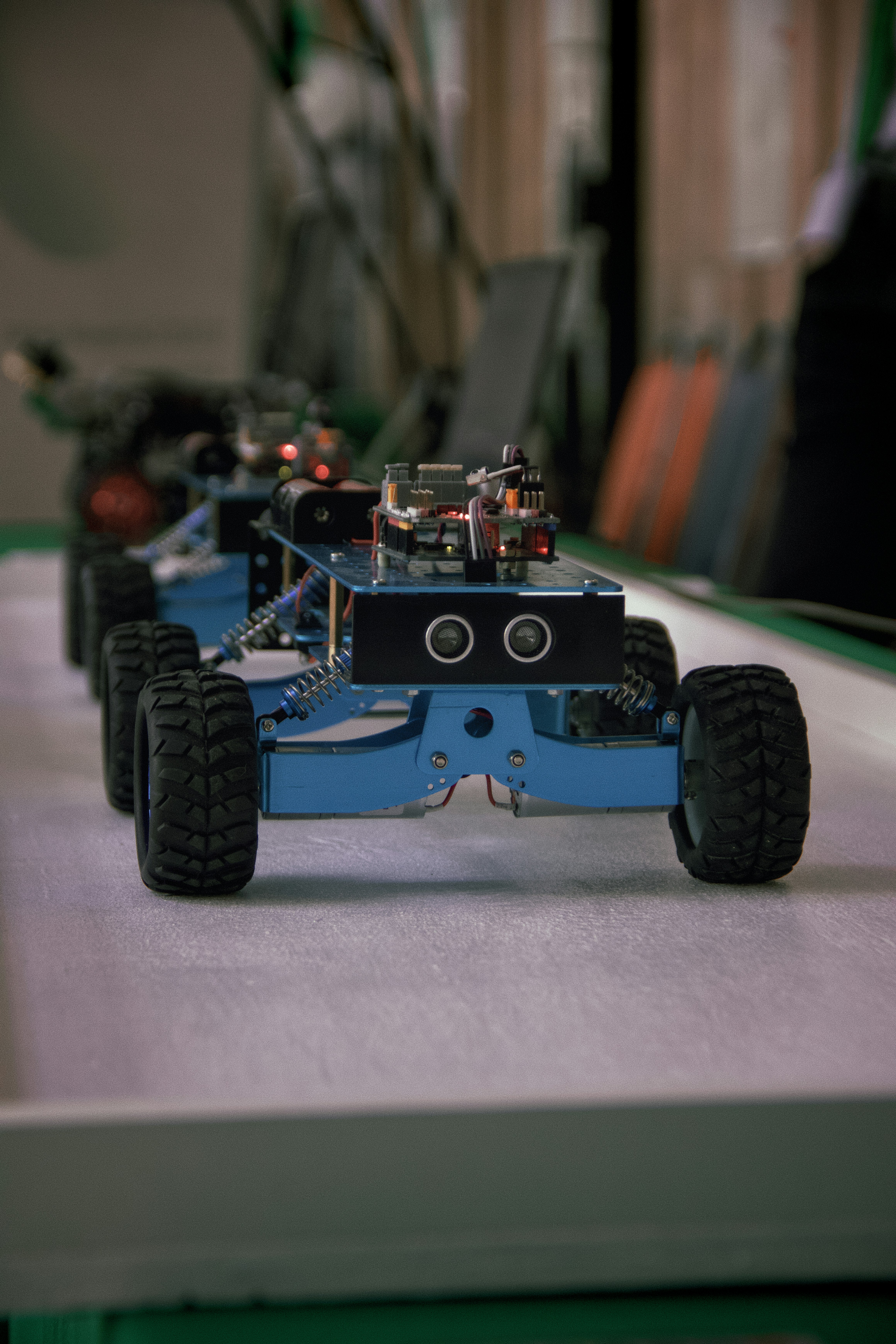Does Raspberry Pi Pico have WiFi? by Robotic Coding Several blue robotic vehicles with wheels lined up